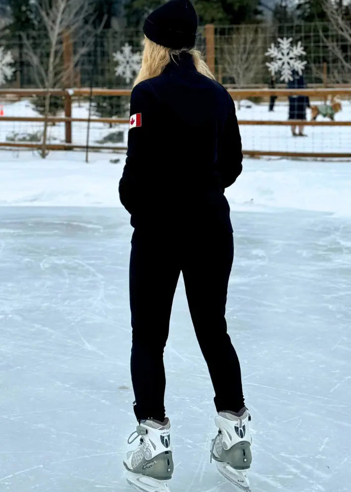 Black full zip fitted Canadian Jacket with Canada flag on left arm.