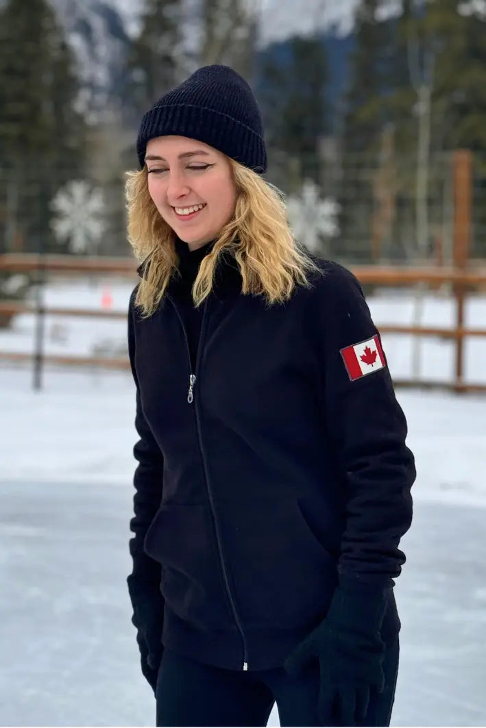 Black full zip fitted Canadian Jacket with Canada flag on left arm.