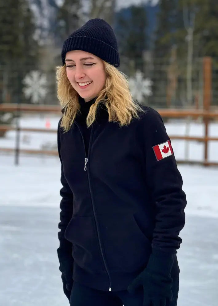 Black full zip fitted Canadian Jacket with Canada flag on left arm.