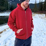 Full Zip red Hoodie with white canada maple leaf logo on left arm.